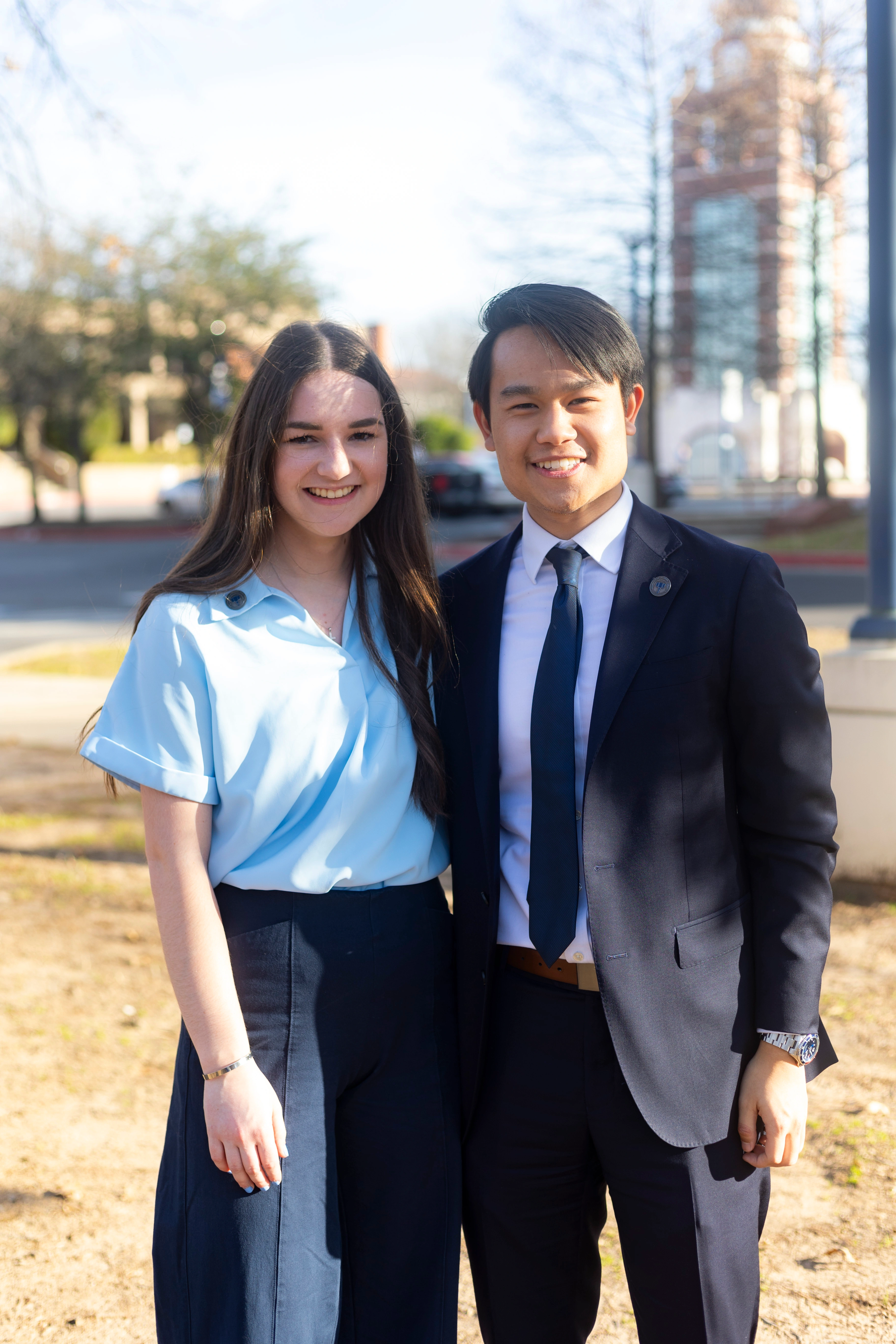 Justin and Anna in formal attire on UAFS campus